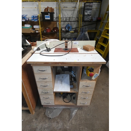 5065 - 1 x UJK Technology router bench fitted with a Freud router 240v and supplied with various router bit... 