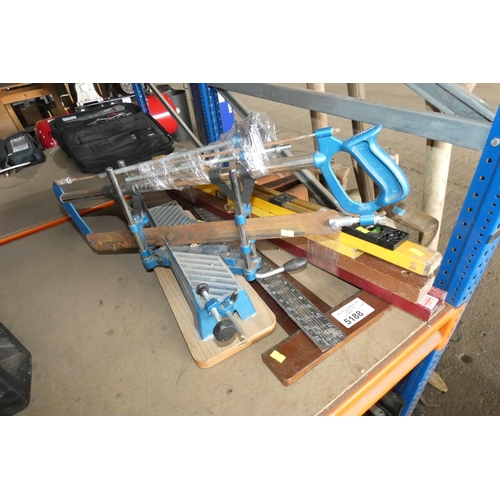 5188 - A quantity of various items including spirit levels and a hand operated mitre saw