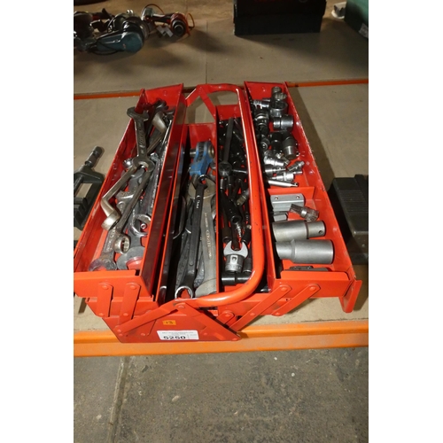 5250 - A red metal metal tool box containing a quantity of various hand tools