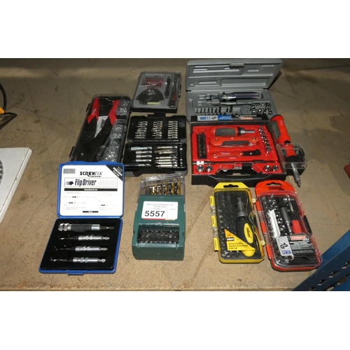 5557 - A quantity of various tools including drill bit sets, a ratchet socket set etc