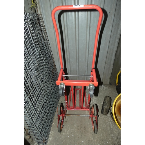 5619 - A red metal tri-wheel step climbing sack truck