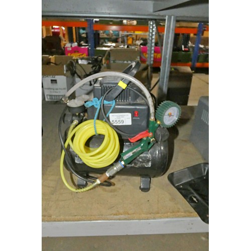 5559 - 1 x Pro User compressor 240v with a length of air hose and a tyre inflator. Tested working