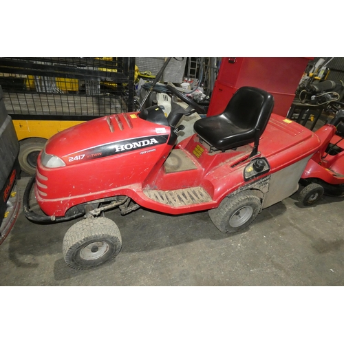 5955 - 1 x Honda 2417 V-Twin petrol engine hydrostatic ride on lawn mower. Please note that no cutting deck... 