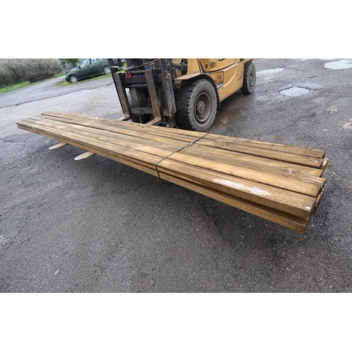 6130 - A quantity of timber measuring approx 10 x 4.5 x 480cm - top stack