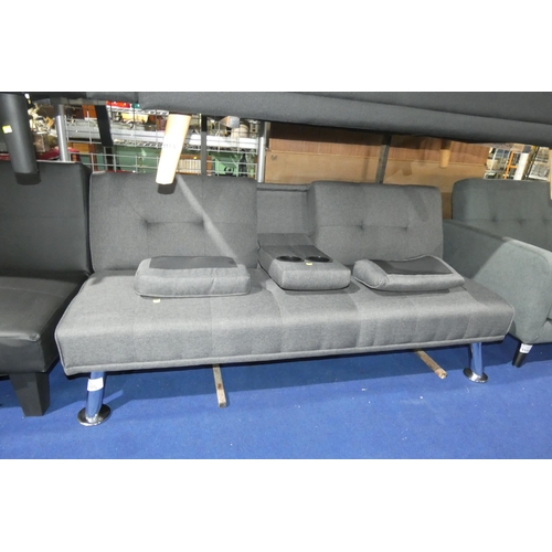 1185 - A grey upholstered upholstered click clack type sofa bed with fold down centre arm rest approx 168cm... 