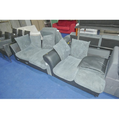 1158 - A black / grey upholstered two part corner sofa approx 150 x 210cm. Please note that this sofa is us... 