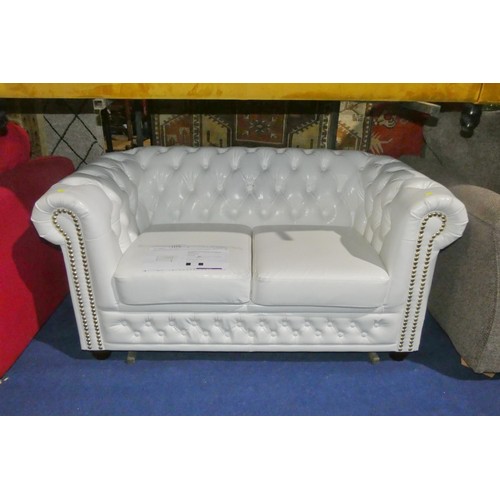 1175 - A Marlow Home white Chesterfield Erra two seat sofa bed RRP £879