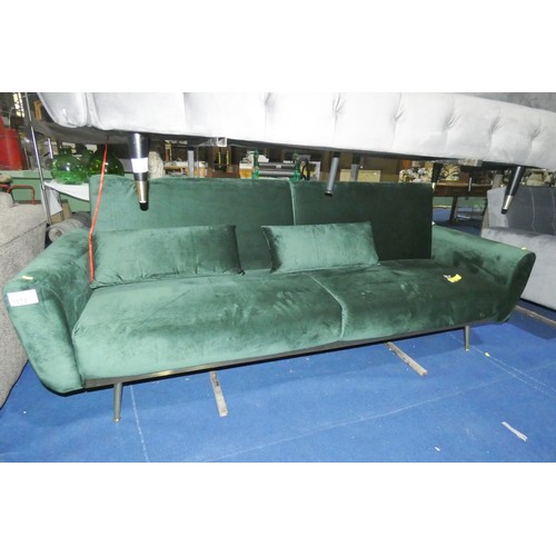 1179 - A velvet opal green upholstered click clack type sofa bed approx 220cm wide