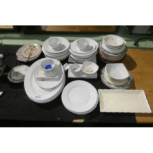 2073 - A quantity of various mixed crockery, mostly white