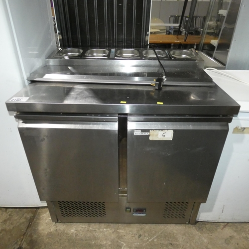 2180 - A 2 door bench fridge with pizza prep station on the top of the unit by Polar - trade. Tested Workin... 