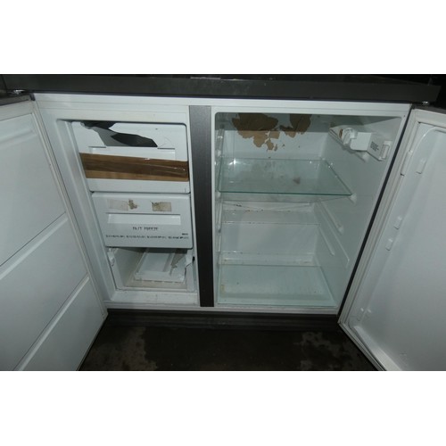 2160 - A stainless steel counter height side by side fridge freezer by Zanussi, freezer to the left approx ... 