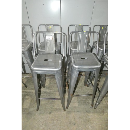 2229 - 4 tall silver metal stools