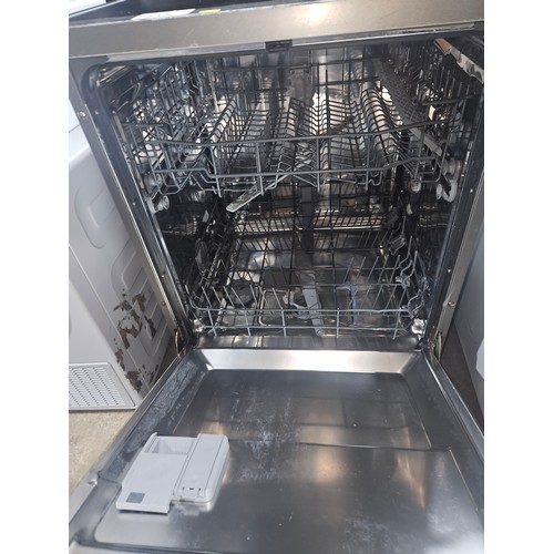 2135 - An under counter dishwasher by new world type NWECO13FSX - trade, removed from a working environment