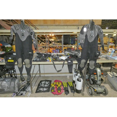 3094 - A quantity of various diving equipment including 2 x O'Three dry suits, 2 x wetsuits, gloves, boots,... 