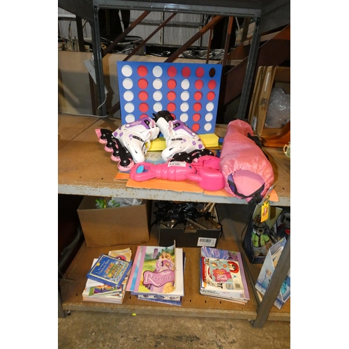 3130 - A quantity of various children's items including books, a folding chair, a Connect 4 game, a pair of... 