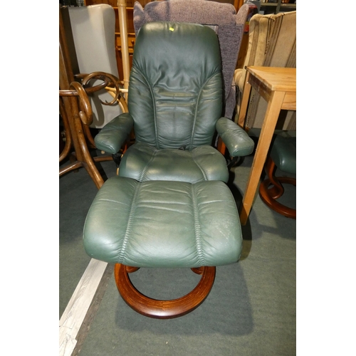 3190 - 1 x Stressless green upholstered reclining armchair with a matching foot stool