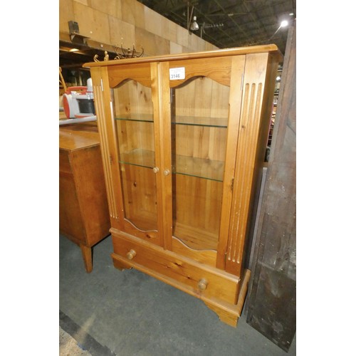 3146 - A Pine display cabinet with two glass doors and one drawer below approx 84 x 31 x 122cm high