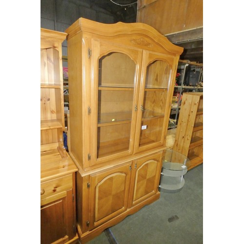 3153 - A two part wooden cabinet with 2 glass doors above approx 115cm wide x 207cm high