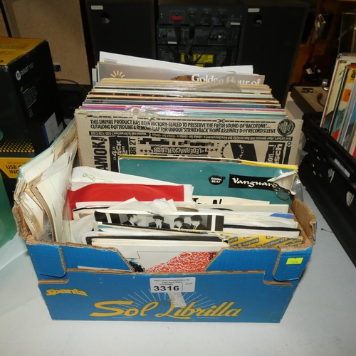 3316 - A box containing a quantity of various records