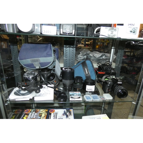 3493 - A Pentax K-r DSLR digital camera type KR/SR, with charger, battery, 3x SD cards, various lenses, 2 x... 