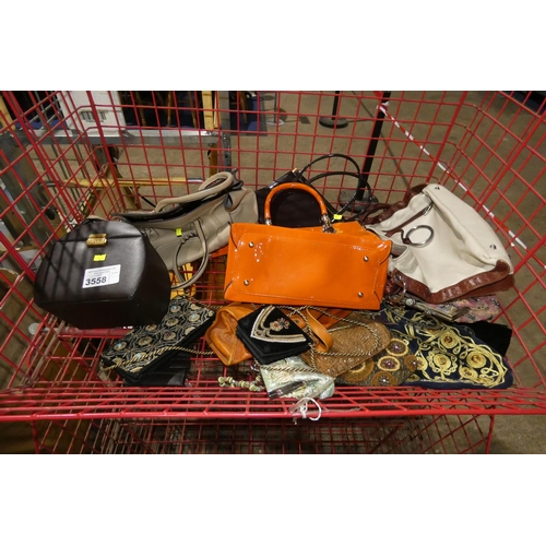 3558 - A quantity of various handbags, contents of 1 basket, basket not included