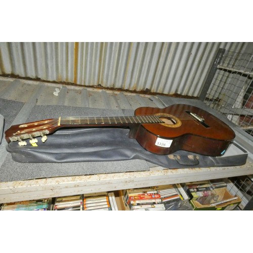 3326 - A 6 string acoustic guitar by Hokada type 8158 with soft carry case