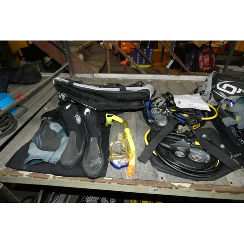 3094 - A quantity of various diving equipment including 2 x O'Three dry suits, 2 x wetsuits, gloves, boots,... 