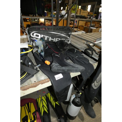 3094 - A quantity of various diving equipment including 2 x O'Three dry suits, 2 x wetsuits, gloves, boots,... 