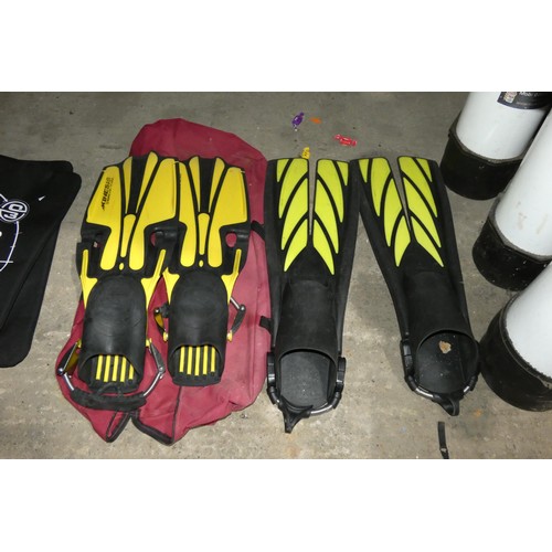 3094 - A quantity of various diving equipment including 2 x O'Three dry suits, 2 x wetsuits, gloves, boots,... 