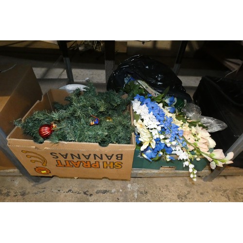 3127 - A quantity of various items including artificial flowers, Christmas ornaments and DVDs. Contents of ... 