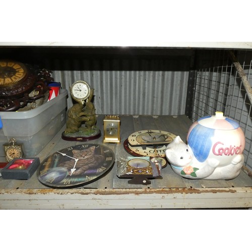 3202 - A quantity of various items including dolls, clocks etc, contents of 1 shelf