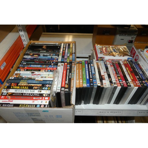 3314 - A large quantity of various DVDs and a quantity of records, contents of 5 boxes, 3 shelves