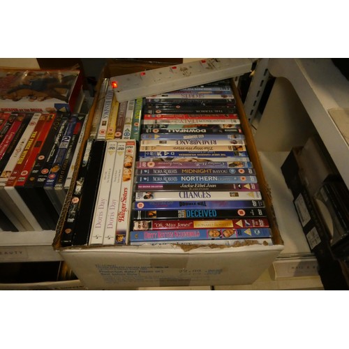 3314 - A large quantity of various DVDs and a quantity of records, contents of 5 boxes, 3 shelves