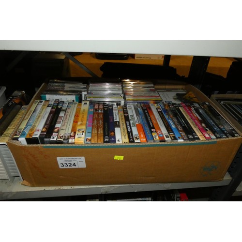 3324 - A quantity of various DVDs and CDs box sets etc. Contents of 3 shelves