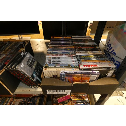 3321 - A large quantity of various DVDs & CDs, contents of 4 shelves