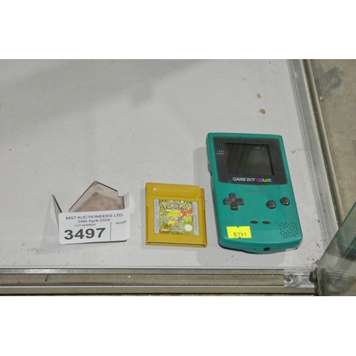 3497 - A green Gameboy color handheld console, missing it's battery cover, tested working, comes with 1 gam... 