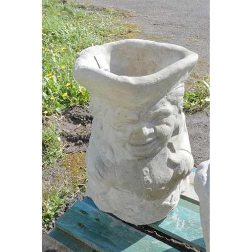 3561 - A concrete Toby jug style planter/umbrella stand