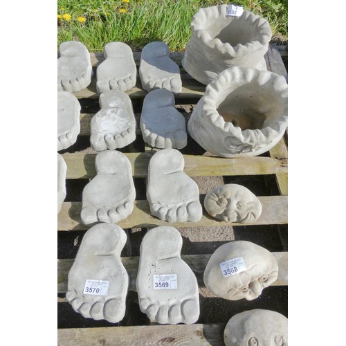 3569 - 4 x concrete foot shaped stepping stones