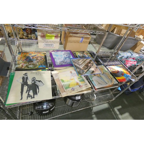 3634 - A quantity of various records including a Jungle Book picture disc, Elton John, The Beatles etc. Con... 