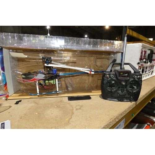 3661 - 2 x Walker radio controlled helicopters models 22E and HM36 supplied with 2 x Walker handheld transm... 