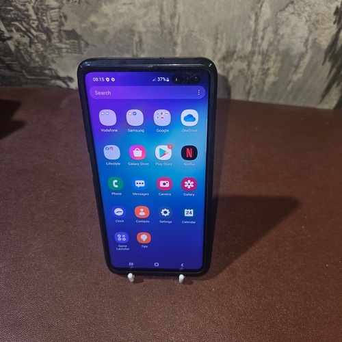 3395 - A used Samsung Galaxy S10 factory reset, previous owner removed, please note charging port is damage... 