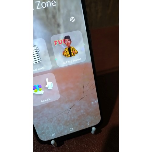 3406 - A used Samsung A40, factory reset, previous owner removed, please note screen is cracked, SIM remove... 