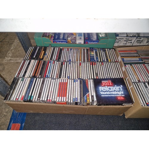 3324 - A quantity of various DVDs and CDs box sets etc. Contents of 3 shelves