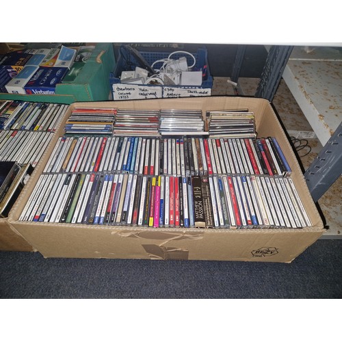 3324 - A quantity of various DVDs and CDs box sets etc. Contents of 3 shelves