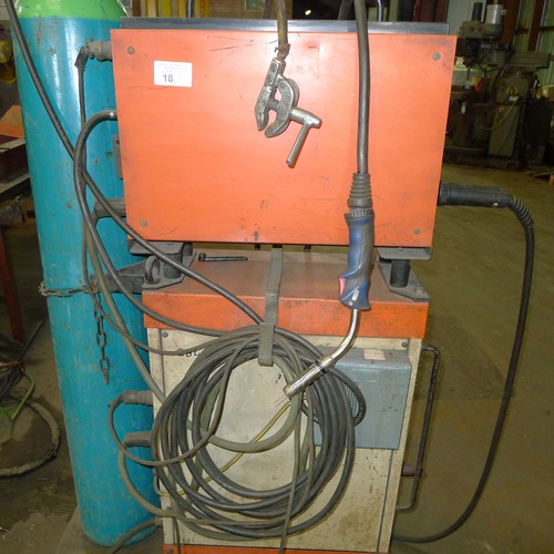 18 - A Kemppi RA400 MIG welder 3ph with a Kemppi Lisa 15 wire feed unit, leads, a MIG torch and gas gauge... 