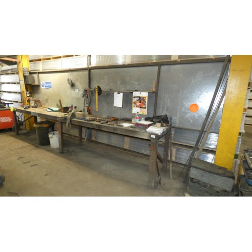 49 - A large metal work bench with metal back approx 495cm wide. Please note that the small tools on the ... 