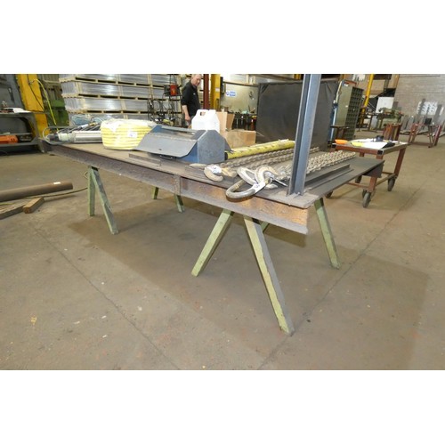 64 - A metal topped trestle work bench approx 250 x 126cm