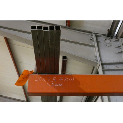 97 - A three section five tier cantilever steel storage rack containing a quantity of stock steel includi... 