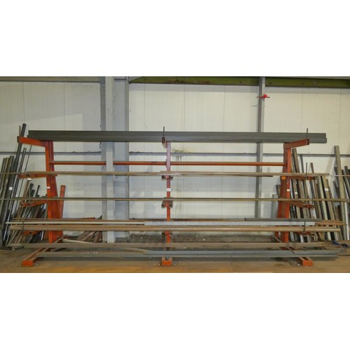 99 - A three section five tier cantilever steel storage rack containing a quantity of stock steel includi... 