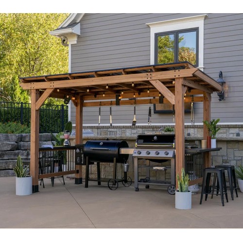 425 - A Backyard Discovery Saxony XL Cedar BBQ gazebo RRP £1829. Supplied in two boxes